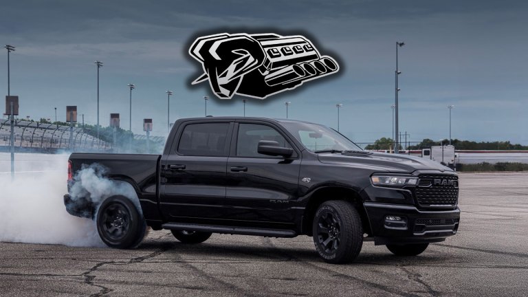 A Ram 1500 does a burnout on a racetrack.